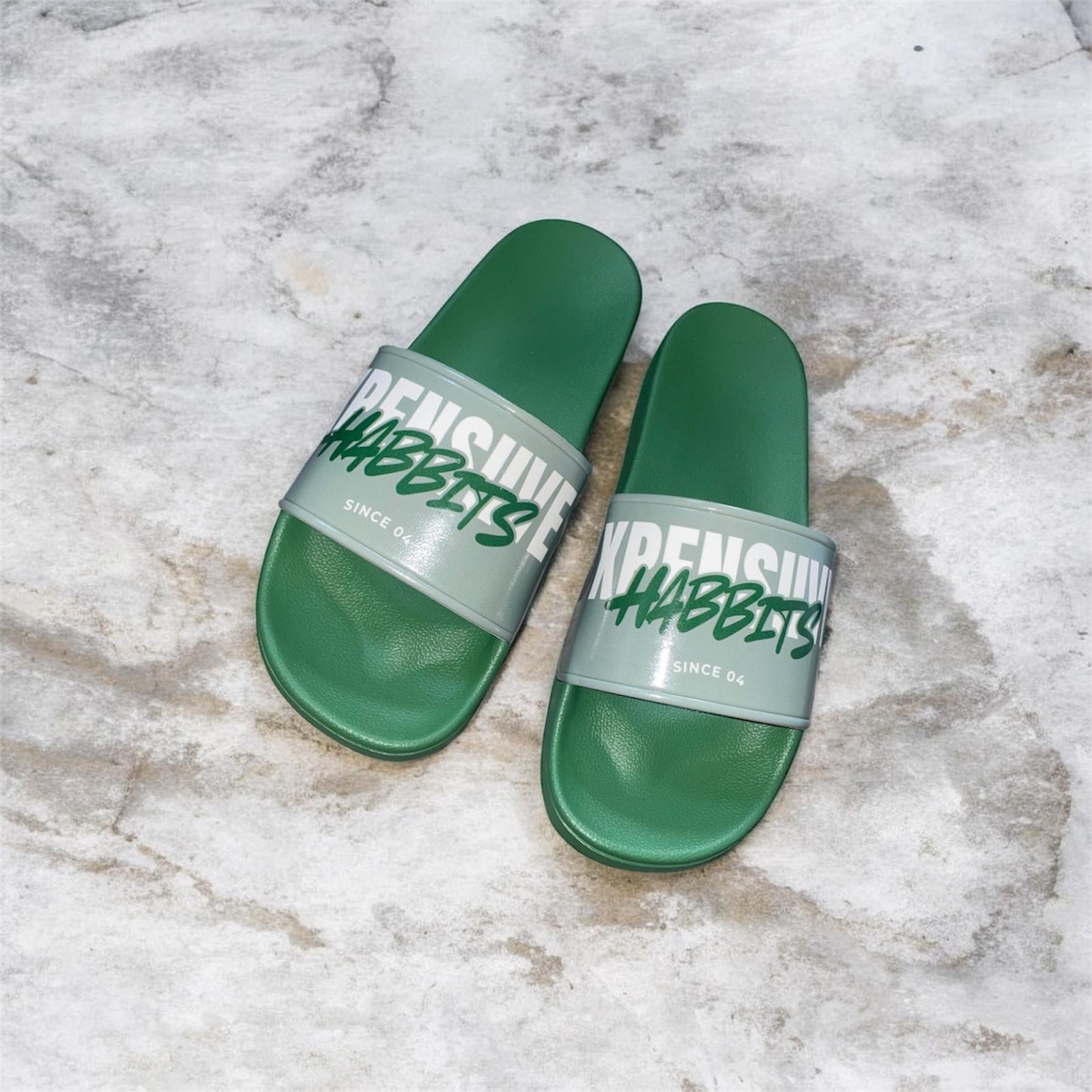 Xpensiive Habbits signature logo slides