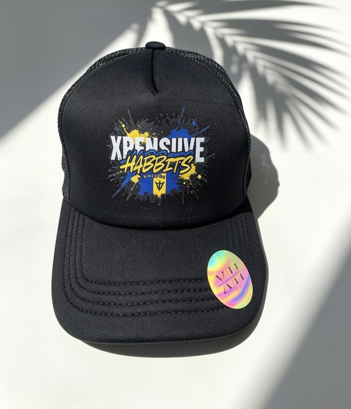 Xpensiive Habbits carnival splash trucker cap